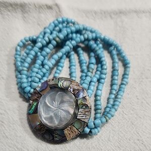 Blue Beaded Bracelet with Shell Accent